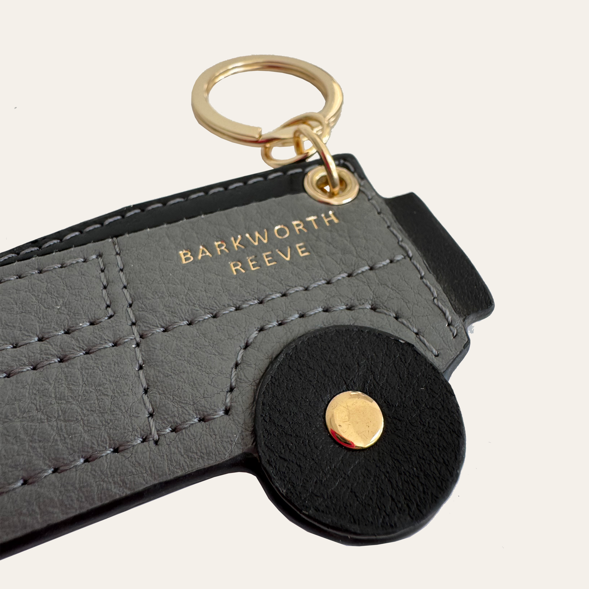 4x4 off road truck kerying in grey leather with black wheels