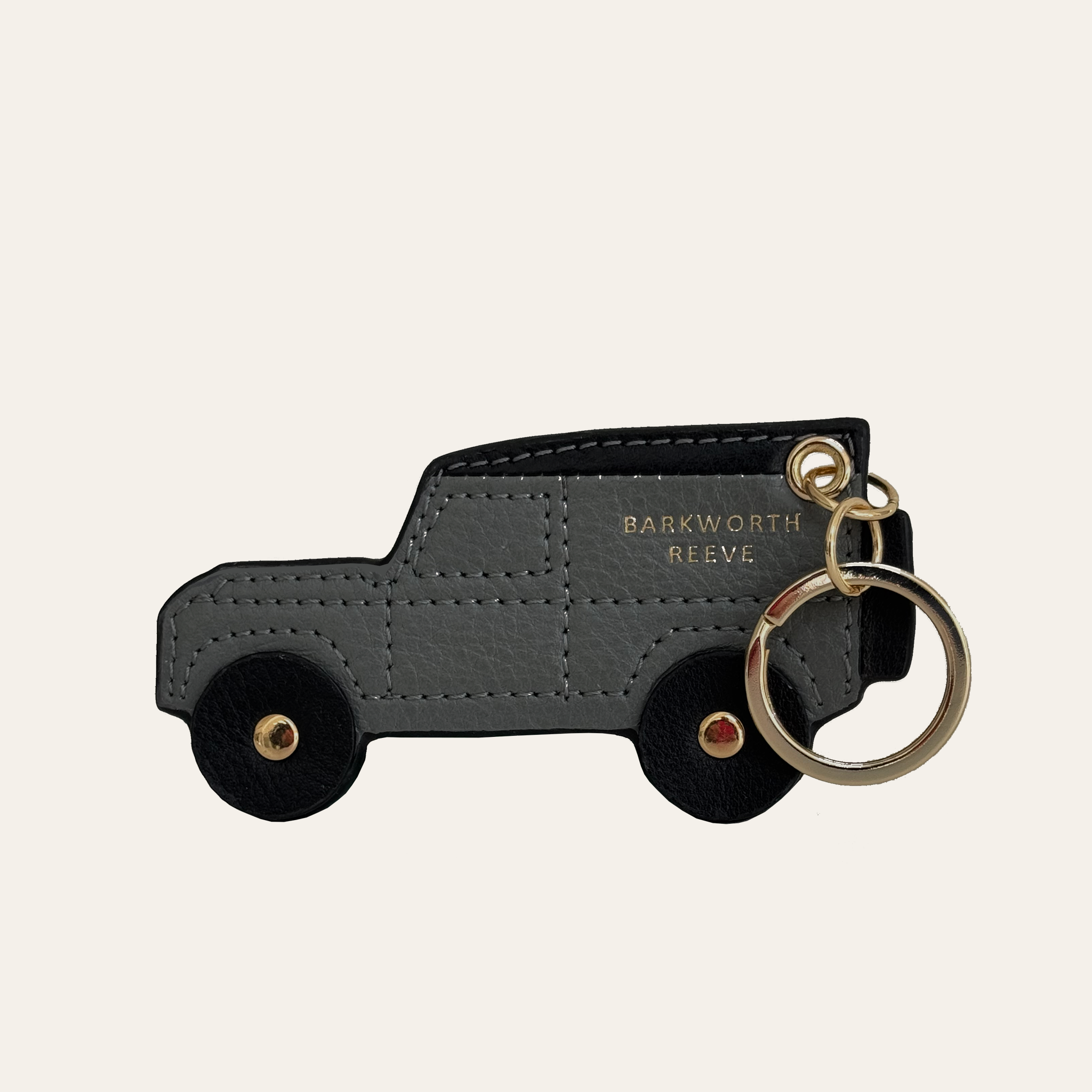 4x4 off road truck, in grey and black Leather with gold split ring and chain