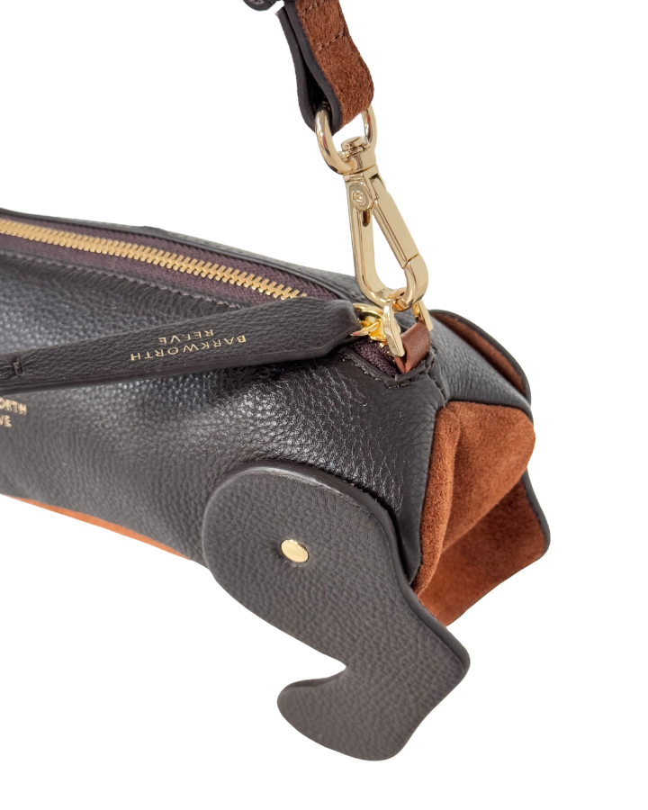 close up of Chocolate Leather sausage dog handbagshowing tan suede tummy and moving legs