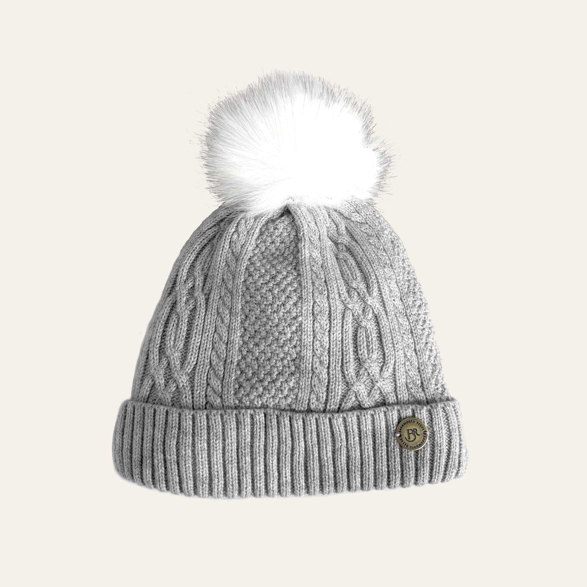light grey marl cable knitted bobble hat with white faux fur pom and branded barkworth reeve plate
