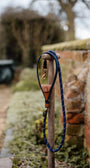 Barkworth Reeve Lead with intergrated poop pouch on a fork in a garden by a wall 