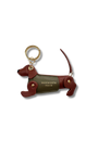 Conker & Khaki  sausage dog kweyring in a green coat. moving legs and tail. gold spit ring 