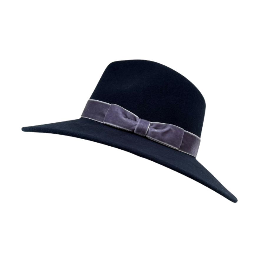 Navy blue wool fedora hat with a light blue velvey band on a white background