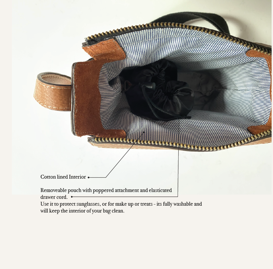 bag open with zip and stripey inteiror lining