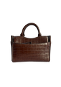 A brown crocodile-embossed leather handbag with a top handle, shown against a plain white background.