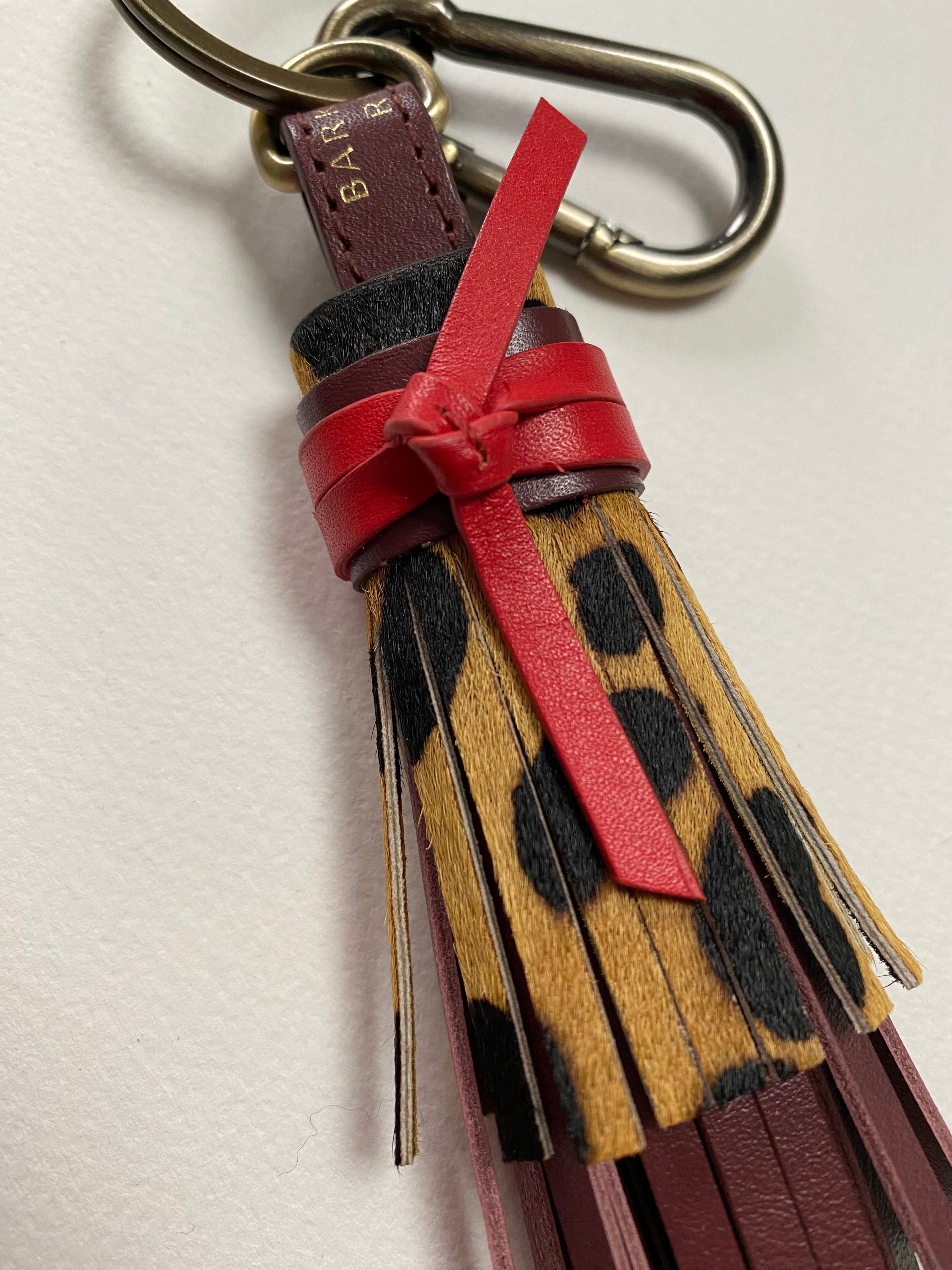 Leopard Leather Tassel Keyring with a pops of Merlot & Red