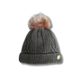 Gray knit beanie with a fur pom-pom on a white background