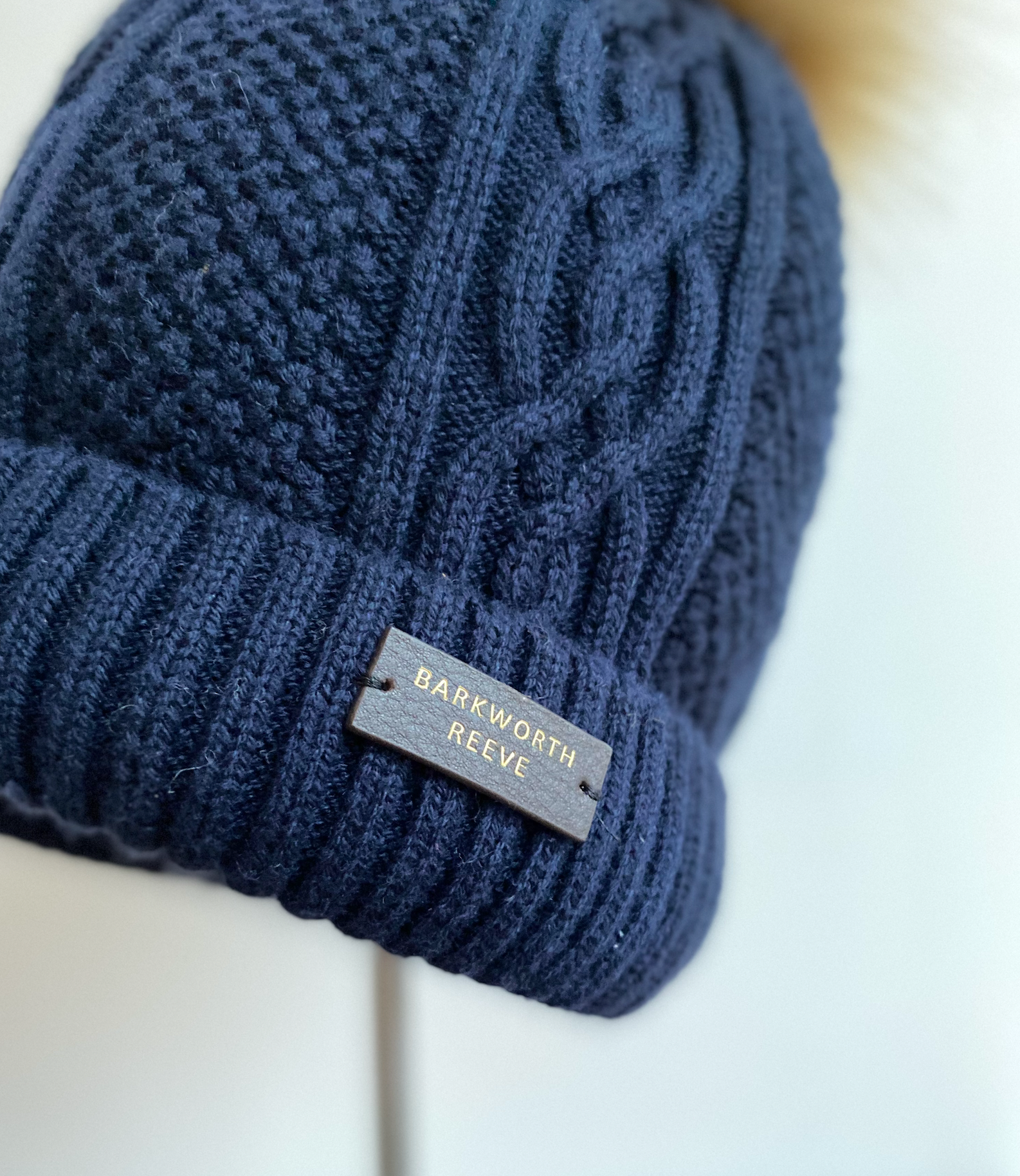 Knitted, Lined Bobble Hat in  Navy Blue Cashmere, Wool & Cotton Mix Yarn
