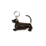 chocolate & tweed sausage dog kweyring in a green coat. moving legs and tail. gold spit ring 
